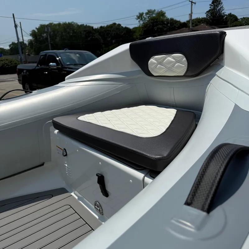 Slide: The Image of 2025 Highfield Sport 420 boat interior with cushioned seating and sleek design. - 8