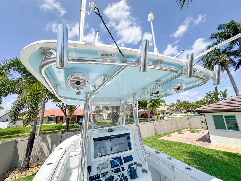 Slide: The Image of 2021 Contender 30 Tournament boat with advanced navigation system and sleek design. - 13