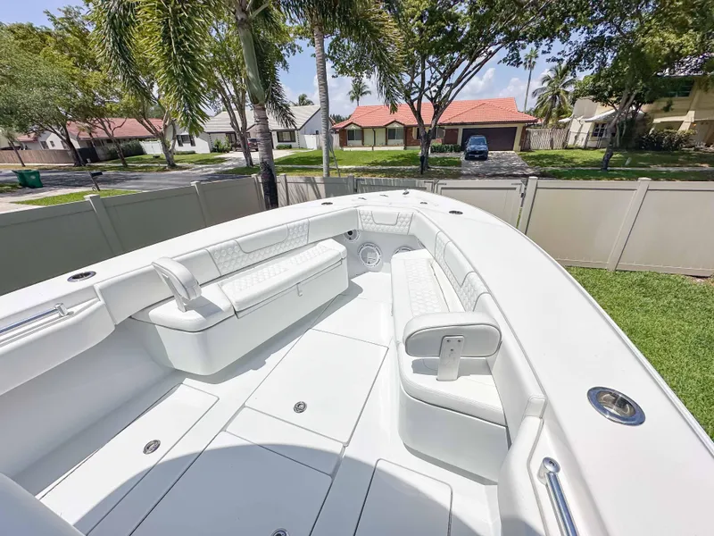 Slide: The Image of 2021 Contender 30 Tournament boat with spacious seating and sleek design. - 23