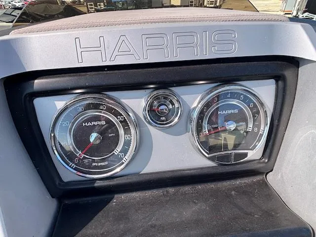 Slide: The Image of Dashboard of 2018 Harris Crowne SL 250 with speedometer and tachometer. - 33