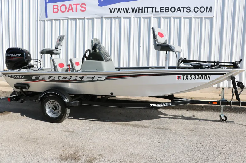 Slide: The Image of 2016 Tracker Pro 160 fishing boat with Mercury engine, displayed at Whittle Boats dealership. - 10
