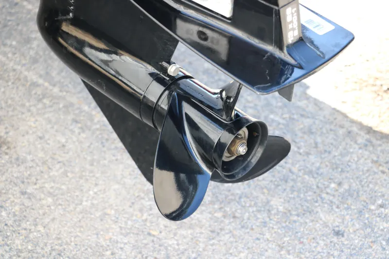 Slide: The Image of 2016 Tracker Pro 160 boat propeller on pavement background. - 24