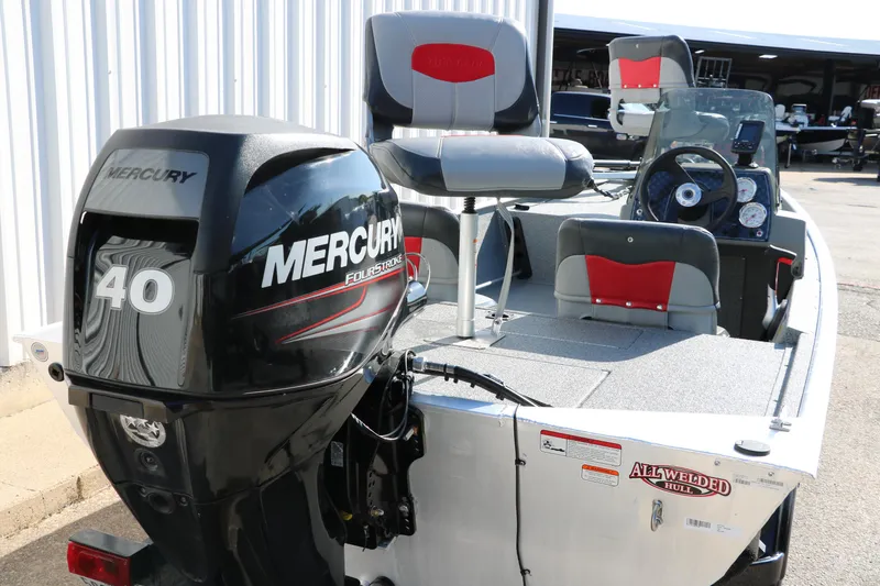 Slide: The Image of 2016 Tracker Pro 160 boat with Mercury 40 engine, featuring seating and control panel. - 4