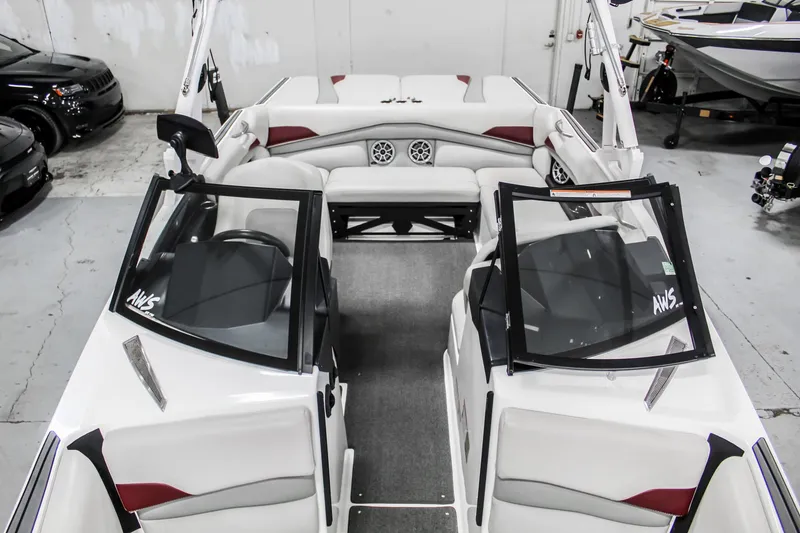 Slide: The Image of 2018 Axis A22 boat interior with open seating and modern design. - 22