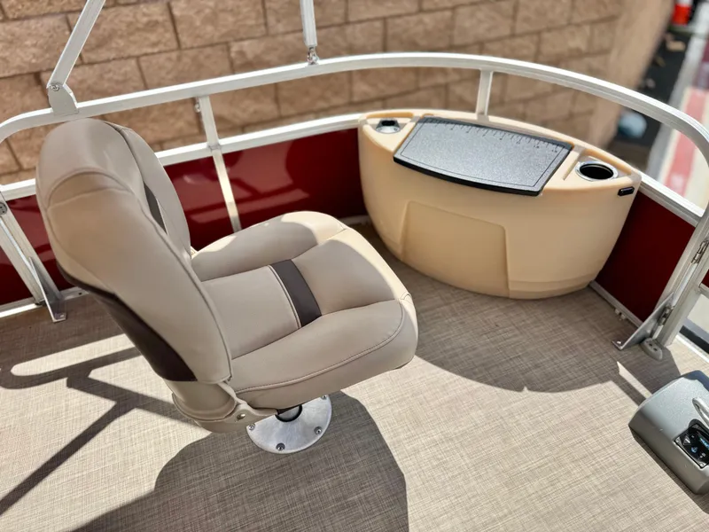 Slide: The Image of 2019 Sun Tracker Fishin' Barge 24 DLX fishing station with chair and console. - 12