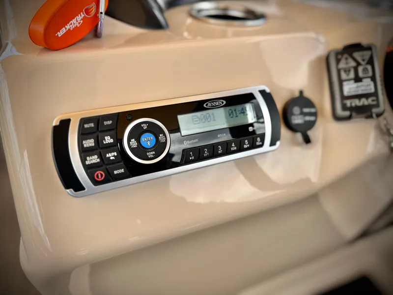 Slide: The Image of Control panel of a 2019 Sun Tracker Fishin' Barge 24 DLX boat. - 29