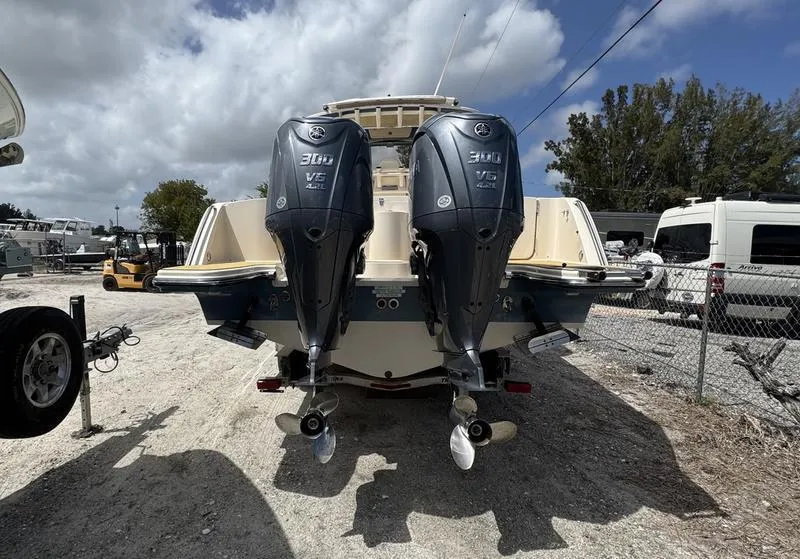 Slide: The Image of 2021 Grady-White Canyon 326 boat with dual Yamaha 300 V6 engines. - 4
