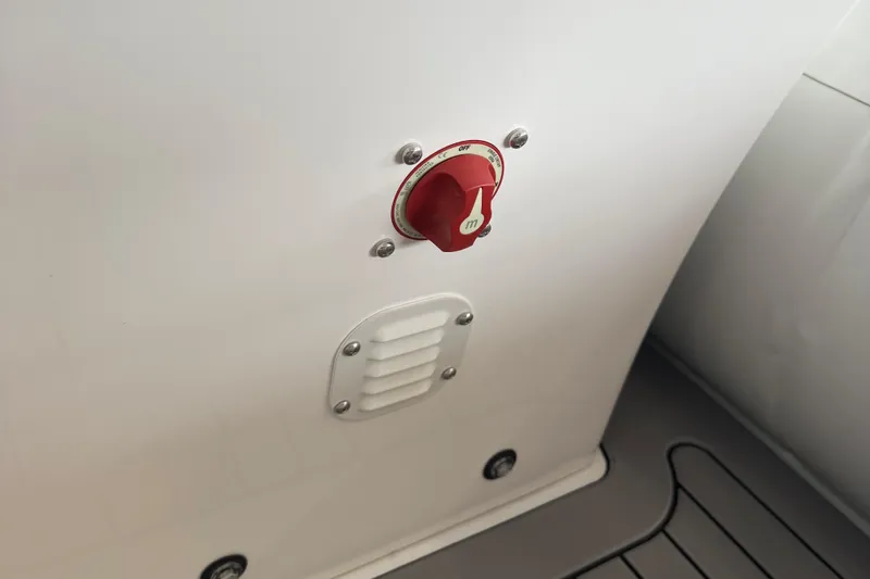 Slide: The Image of Red switch on 2025 Highfield Sport 460 boat interior panel. - 10