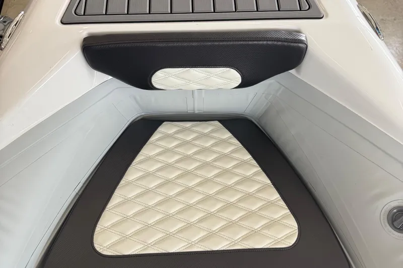 Slide: The Image of Luxurious seating detail of 2025 Highfield Sport 460 boat with diamond-pattern upholstery. - 15