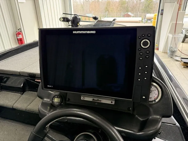 Slide: The Image of Dashboard of a 2021 Phoenix 721 ProXP with Humminbird electronics. - 19