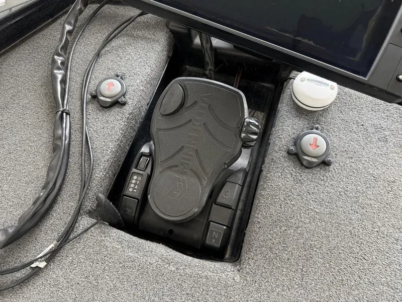 Slide: The Image of Foot pedal controls on a 2021 Phoenix 721 ProXP boat. - 4