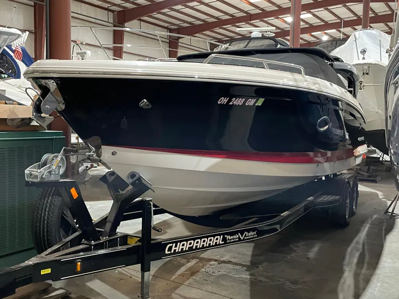Slide: The Image of 2017 Chaparral 287 SSX boat on trailer in indoor storage facility. - 2