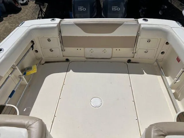 Slide: The Image of 2006 Scout 262 Abaco boat deck with storage compartments and seating. - 16