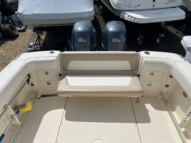 Slide: The Image of 2006 Scout 262 Abaco boat deck with seating and twin Yamaha 150 engines. - 18