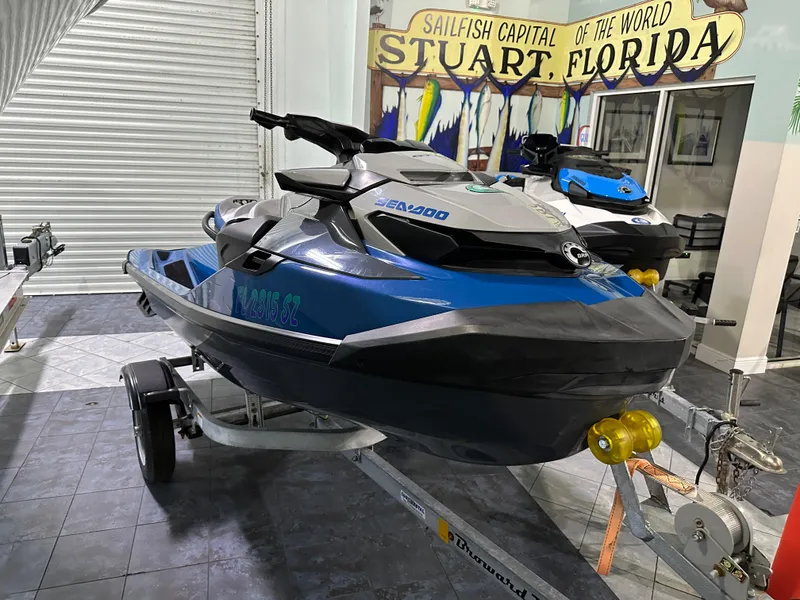 Slide: The Image of 2021 Sea-Doo GTX 170 jet ski on trailer in Stuart, Florida showroom. - 2