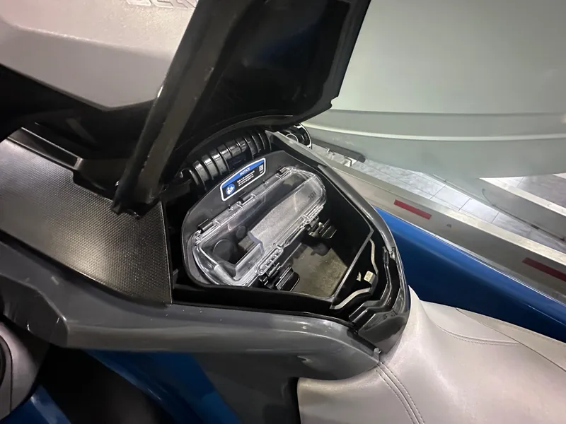 Slide: The Image of 2021 Sea-Doo GTX 170 storage compartment with USB port, open view. - 7