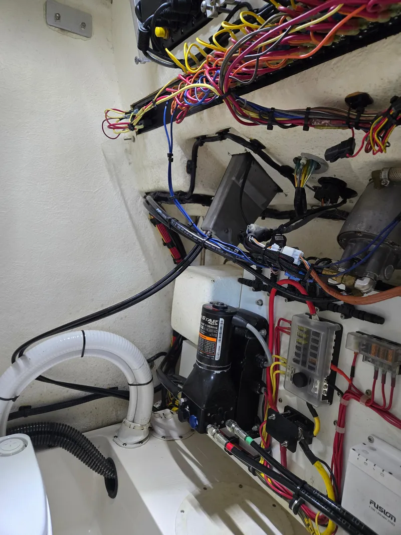 Slide: The Image of 2021 Sea Born LX22 Center Console wiring and electrical components inside the boat. - 10