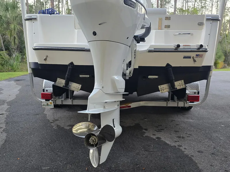 Slide: The Image of 2021 Sea Born LX22 Center Console boat with outboard motor on trailer. - 44
