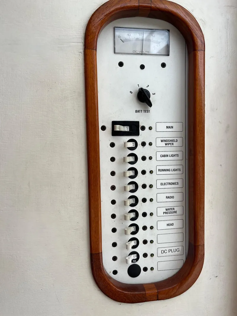 Slide: The Image of Electrical control panel on a 1986 Dyer 29 Trunk Cabin boat. - 12