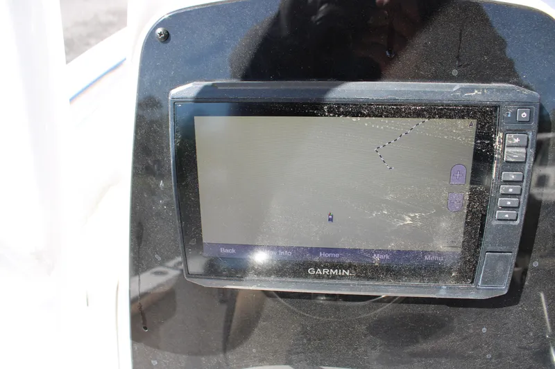 Slide: The Image of Garmin navigation system on 2019 Tidewater 210 CC Adventure boat dashboard. - 16