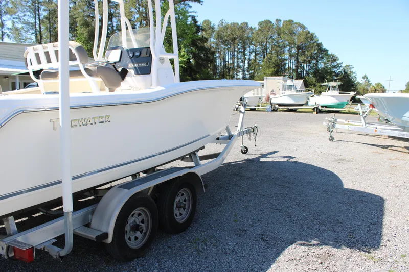Slide: The Image of 2019 Tidewater 210 CC Adventure boat on trailer in outdoor lot. - 24