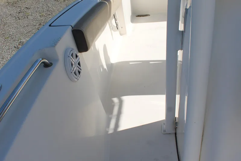 Slide: The Image of 2019 Tidewater 210 CC Adventure boat interior with speaker and railing. - 29