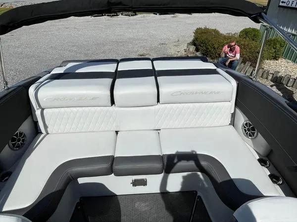 Slide: The Image of 2023 Crownline 220 SS LPX boat interior with white and gray seating. - 11