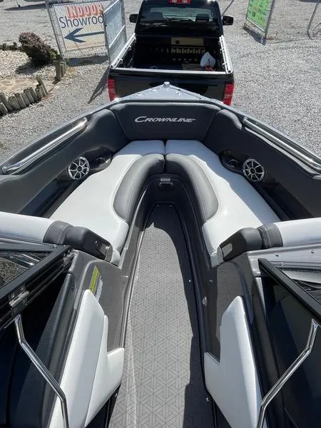 Slide: The Image of 2023 Crownline 220 SS LPX boat interior with sleek seating and modern design. - 7