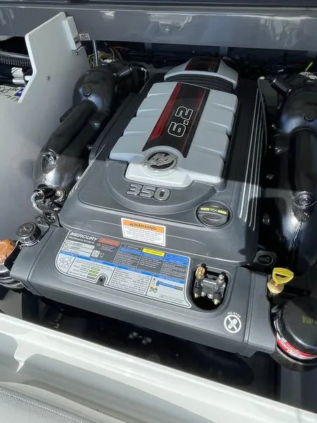 Slide: The Image of 2023 Crownline 220 SS LPX engine compartment featuring a powerful 6.2L 350 HP engine. - 8