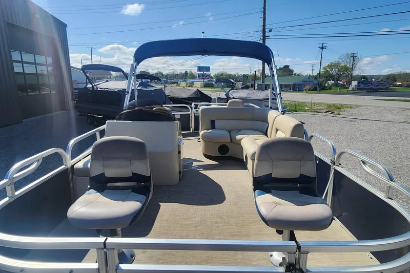 Slide: The Image of 2015 Landau A'Lure 212 Fishing boat with seating, canopy, and open deck in a sunny outdoor setting. - 5