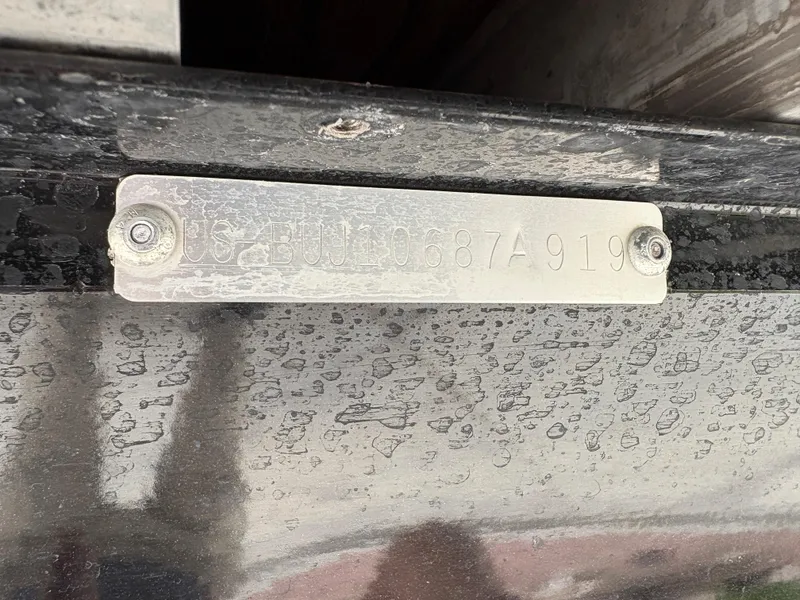 Slide: The Image of VIN plate on a 2019 Regency 210 DL3 boat, showing identification number. - 15