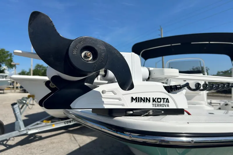Slide: The Image of Minn Kota Terrova motor on 2020 Frontier 2104 CC boat, sunny day background. - 14