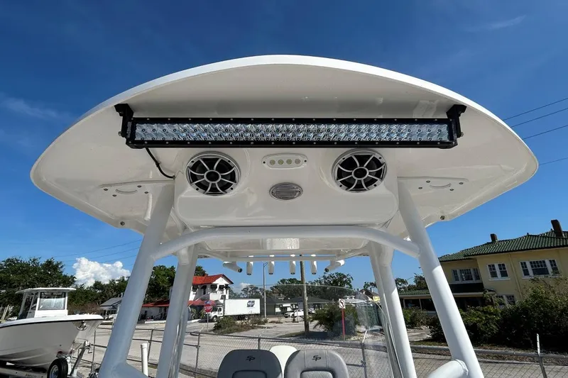 Slide: The Image of 2021 Sea Pro 219 Deep-V boat with T-top speakers and LED light bar. - 12