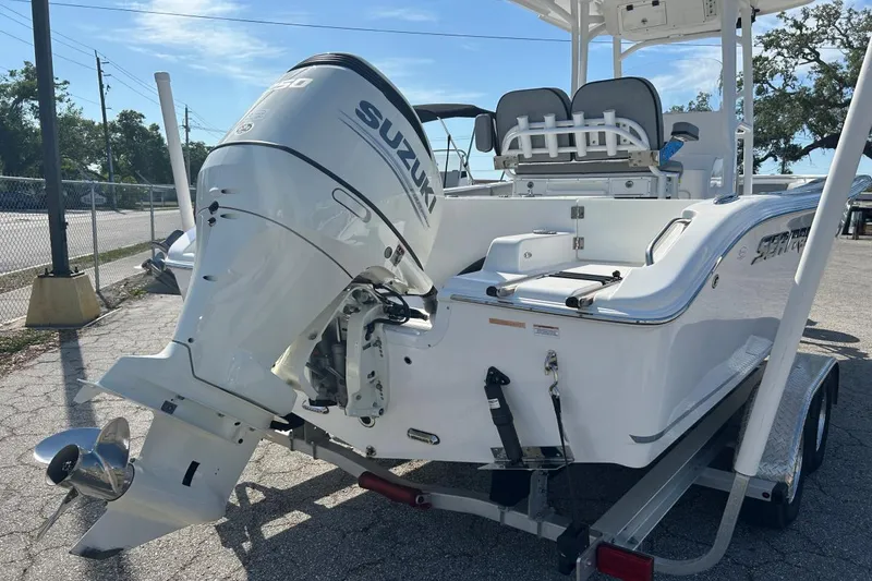 Slide: The Image of 2021 Sea Pro 219 Deep-V boat with Suzuki outboard motor on a trailer. - 14