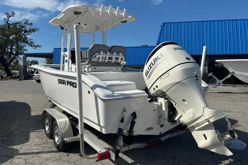 Slide: The Image of 2021 Sea Pro 219 Deep-V boat with Suzuki outboard motor on a trailer. - 15