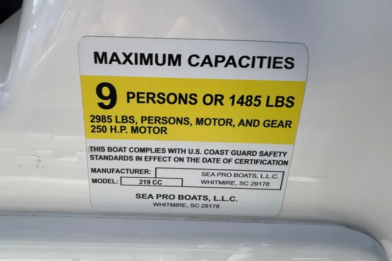 Slide: The Image of Sea Pro 219 Deep-V 2021 boat capacity label, 9 persons or 1485 lbs, 250 HP motor. - 21