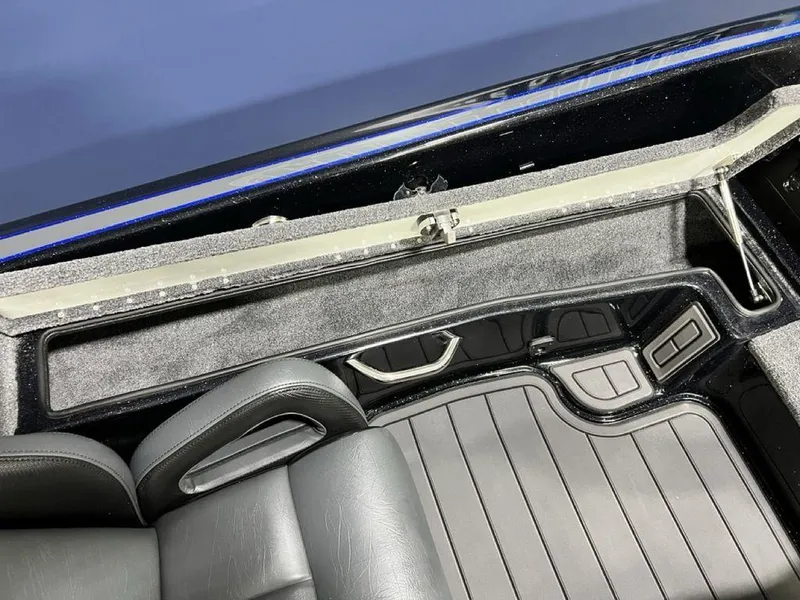 Slide: The Image of Interior view of 2025 Phoenix 920 Elite, showcasing sleek black seating and modern design. - 16