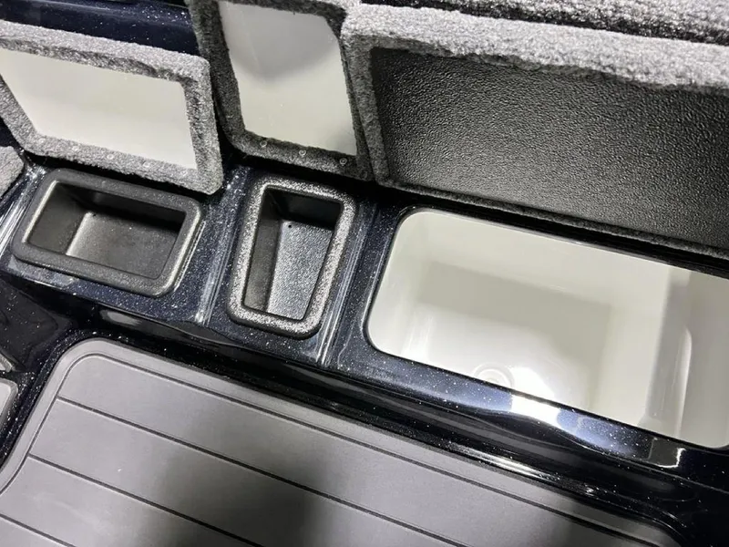 Slide: The Image of Interior compartments of 2025 Phoenix 920 Elite, showcasing organized storage spaces. - 18