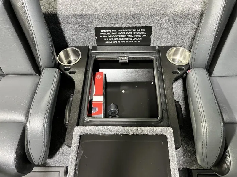Slide: The Image of Interior of 2025 Phoenix 920 Elite with cup holders and storage compartment. - 20