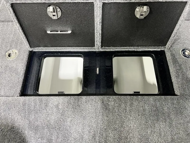 Slide: The Image of 2025 Phoenix 920 Elite storage compartments with secure latches and sleek design. - 26