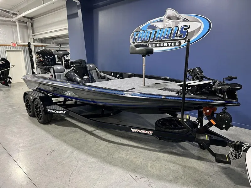 Slide: The Image of 2025 Phoenix 920 Elite fishing boat displayed at Foothills Marine Center. - 4