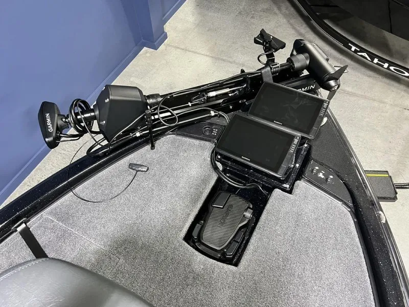 Slide: The Image of 2025 Phoenix 920 Elite boat with advanced Garmin navigation system and dual screens. - 5