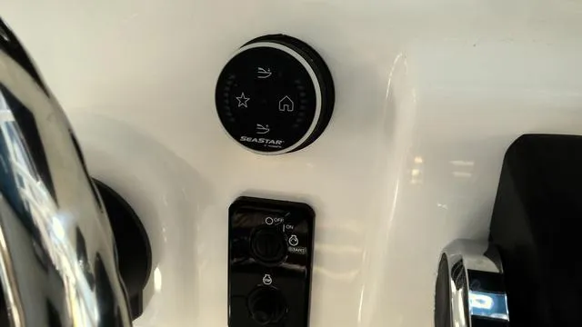 Slide: The Image of Control panel of 2025 Sea Pro 210 Bay boat with SeaStar system. - 14