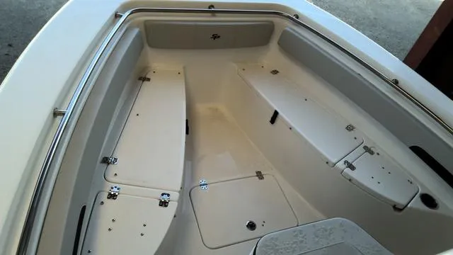 Slide: The Image of 2025 Sea Pro 222 Center Console boat interior with storage compartments. - 16