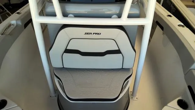 Slide: The Image of 2025 Sea Pro 222 Center Console boat interior with cushioned seating. - 17