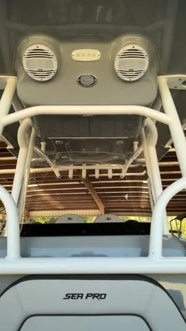 Slide: The Image of 2025 Sea Pro 222 Center Console boat interior with speakers and storage. - 18