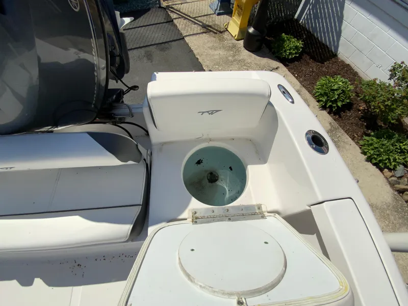 Slide: The Image of 2015 Tidewater 196 DC Explorer boat interior with seating and storage compartments. - 18