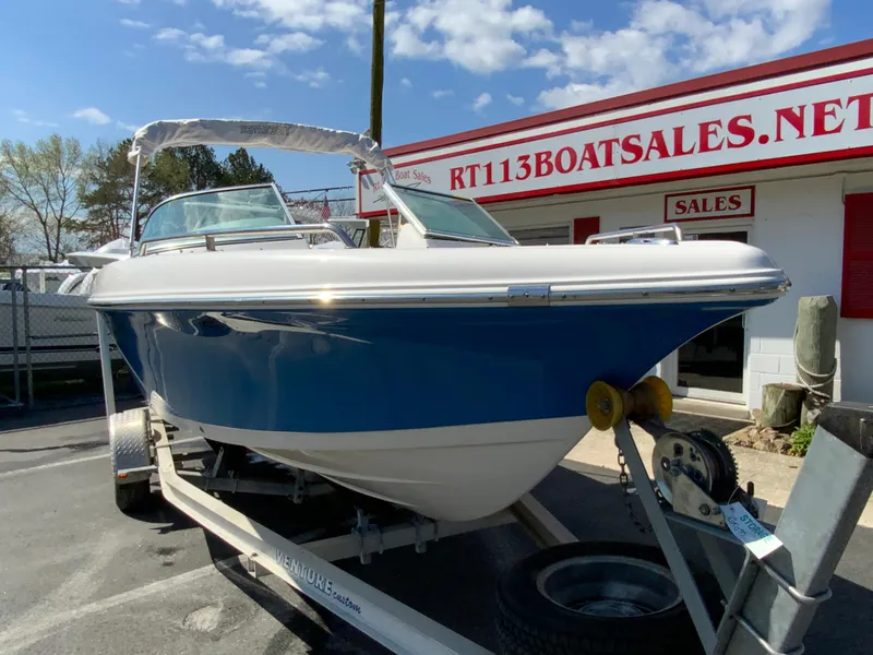 Slide: The Image of 2015 Tidewater 196 DC Explorer boat on trailer at dealership. - 3