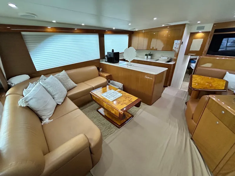 Slide: The Image of Luxurious interior of a 2001 Viking 55 Convertible yacht with leather seating and modern amenities. - 2