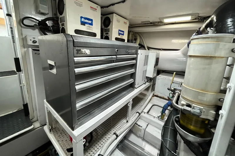Slide: The Image of Engine room of 2001 Viking 55 Convertible with tool chest and equipment. - 20